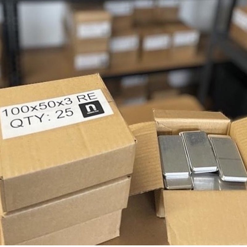 Unboxed 100 by 50 by 3 millimeter aluminum end caps ready for install.